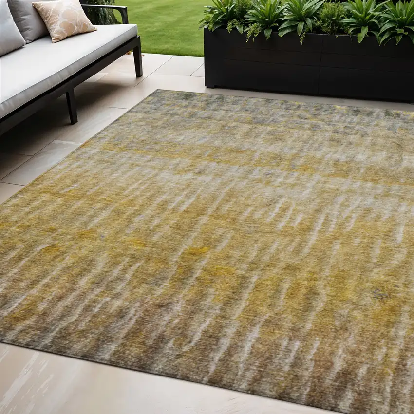 Gold Beige And Gray Abstract Washable Indoor Outdoor Area Rug Photo 1