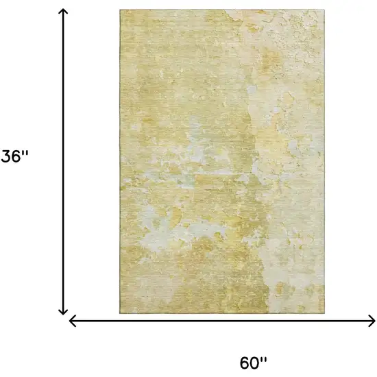 Gold Beige And Ivory Abstract Washable Area Rug With UV Protection Photo 3