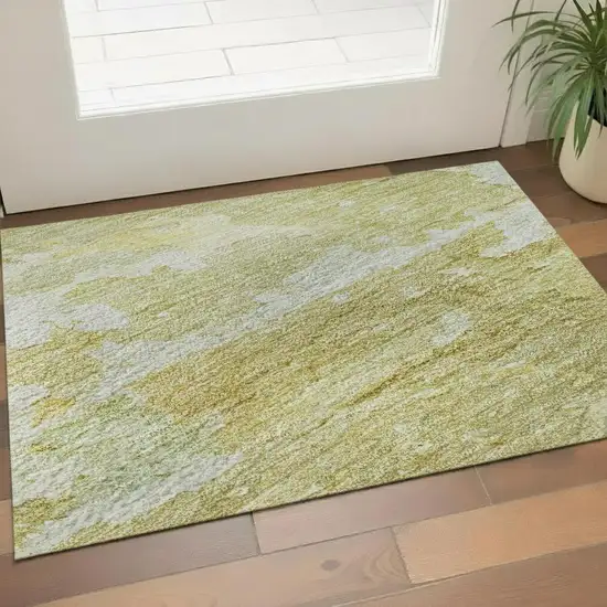 Gold Beige And Ivory Abstract Washable Area Rug With UV Protection Photo 2