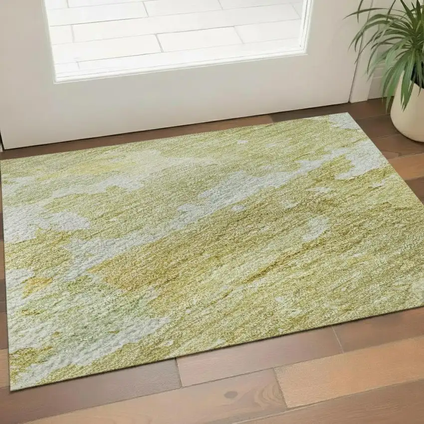 Gold Beige And Ivory Abstract Washable Area Rug With UV Protection Photo 2