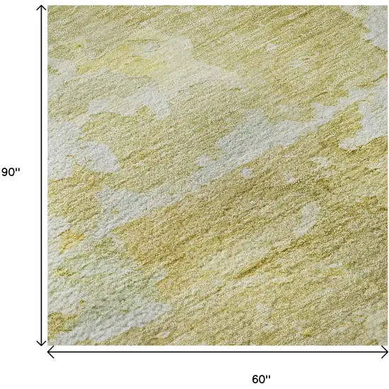 Gold Beige And Ivory Abstract Washable Area Rug With UV Protection Photo 9