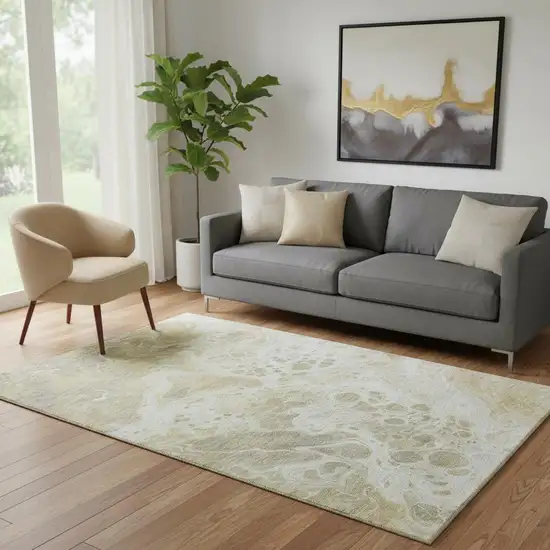 Gold Beige And Ivory Abstract Washable Area Rug With UV Protection Photo 2