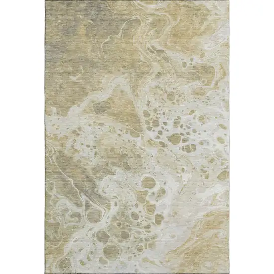 Gold Beige And Ivory Abstract Washable Area Rug With UV Protection Photo 1