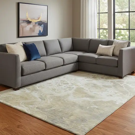 Gold Beige And Ivory Abstract Washable Area Rug With UV Protection Photo 2