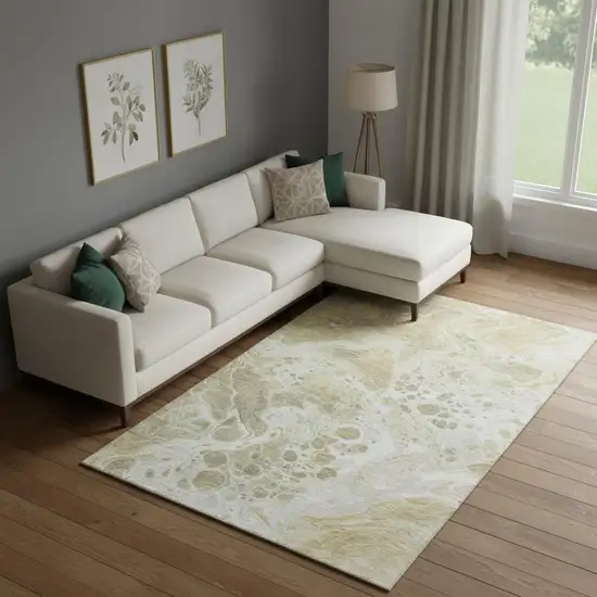 Gold Beige And Ivory Abstract Washable Area Rug With UV Protection Photo 2