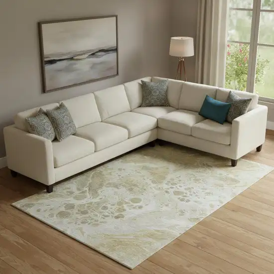 Gold Beige And Ivory Abstract Washable Area Rug With UV Protection Photo 2