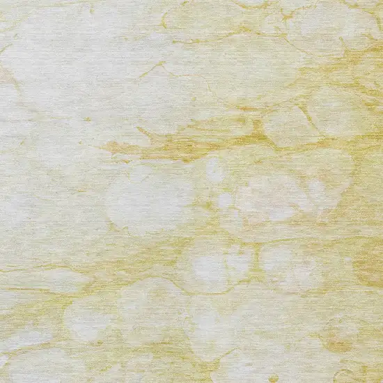 Gold Beige And Ivory Abstract Washable Indoor Outdoor Area Rug Photo 4