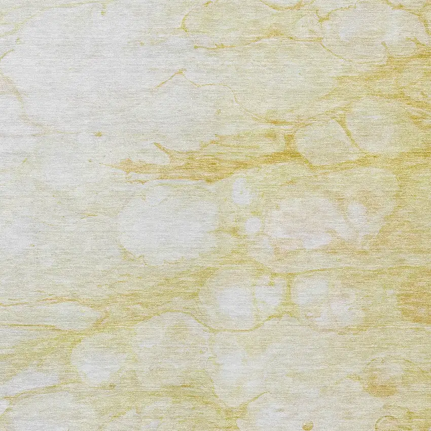 Gold Beige And Ivory Abstract Washable Indoor Outdoor Area Rug Photo 4