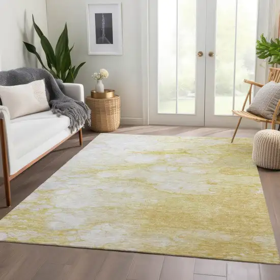 Gold Beige And Ivory Abstract Washable Indoor Outdoor Area Rug Photo 7