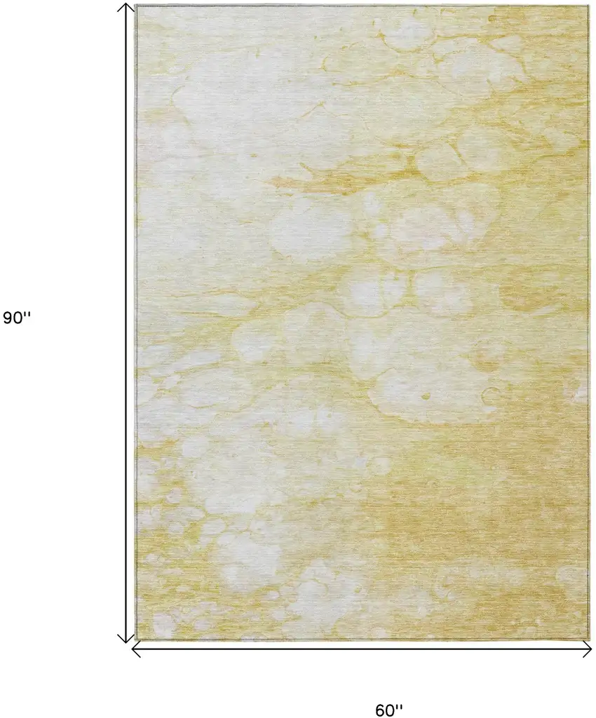 Gold Beige And Ivory Abstract Washable Indoor Outdoor Area Rug Photo 9
