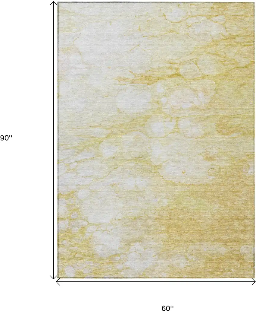 Gold Beige And Ivory Abstract Washable Indoor Outdoor Area Rug Photo 9