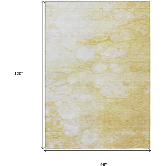 Gold Beige And Ivory Abstract Washable Indoor Outdoor Area Rug Photo 3