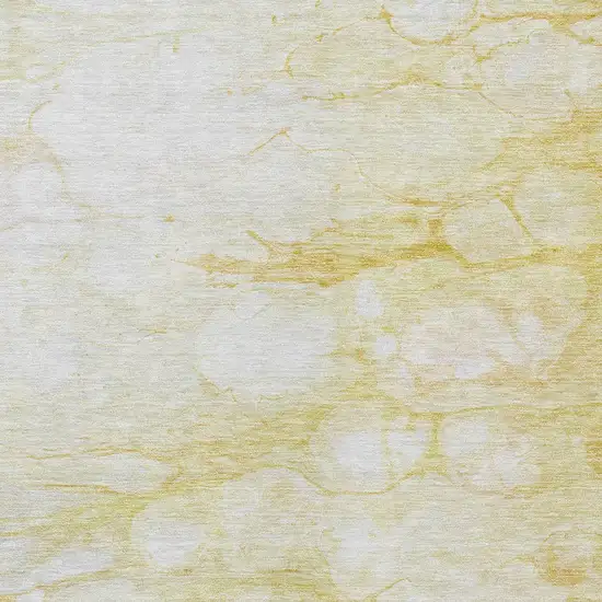 Gold Beige And Ivory Abstract Washable Indoor Outdoor Area Rug Photo 4