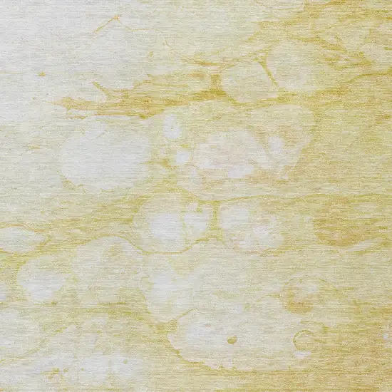 Gold Beige And Ivory Abstract Washable Indoor Outdoor Area Rug Photo 5
