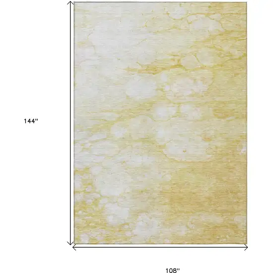 Gold Beige And Ivory Abstract Washable Indoor Outdoor Area Rug Photo 3