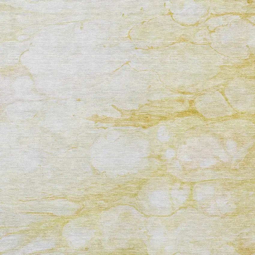 Gold Beige And Ivory Abstract Washable Indoor Outdoor Area Rug Photo 4