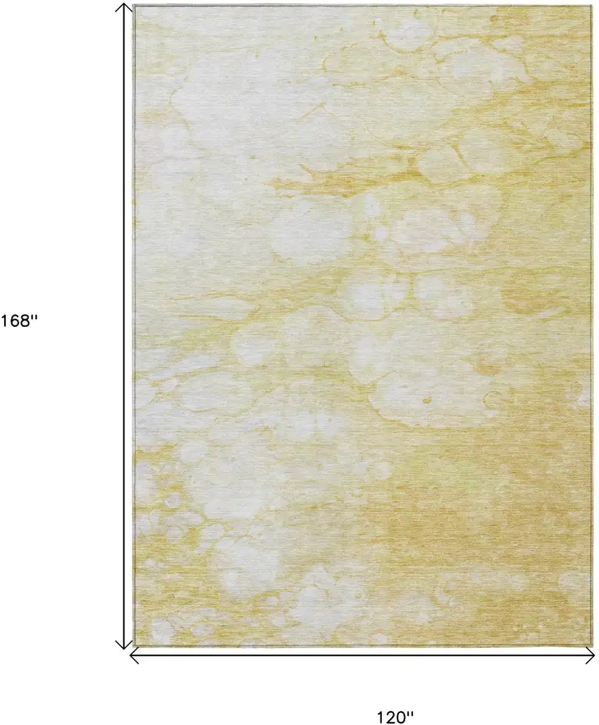 Gold Beige And Ivory Abstract Washable Indoor Outdoor Area Rug Photo 3