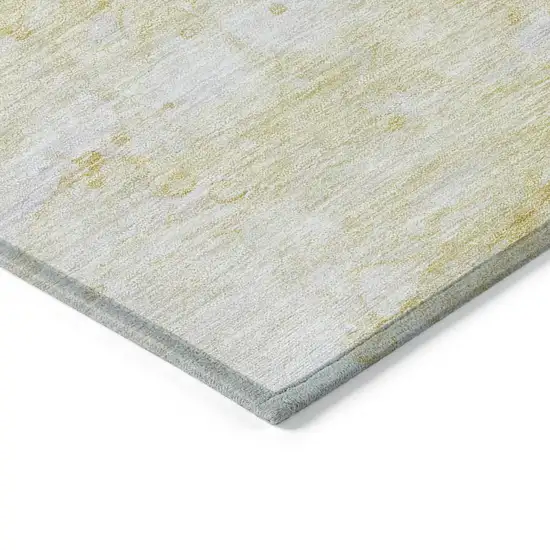 Gold Beige And Ivory Abstract Washable Indoor Outdoor Area Rug Photo 3