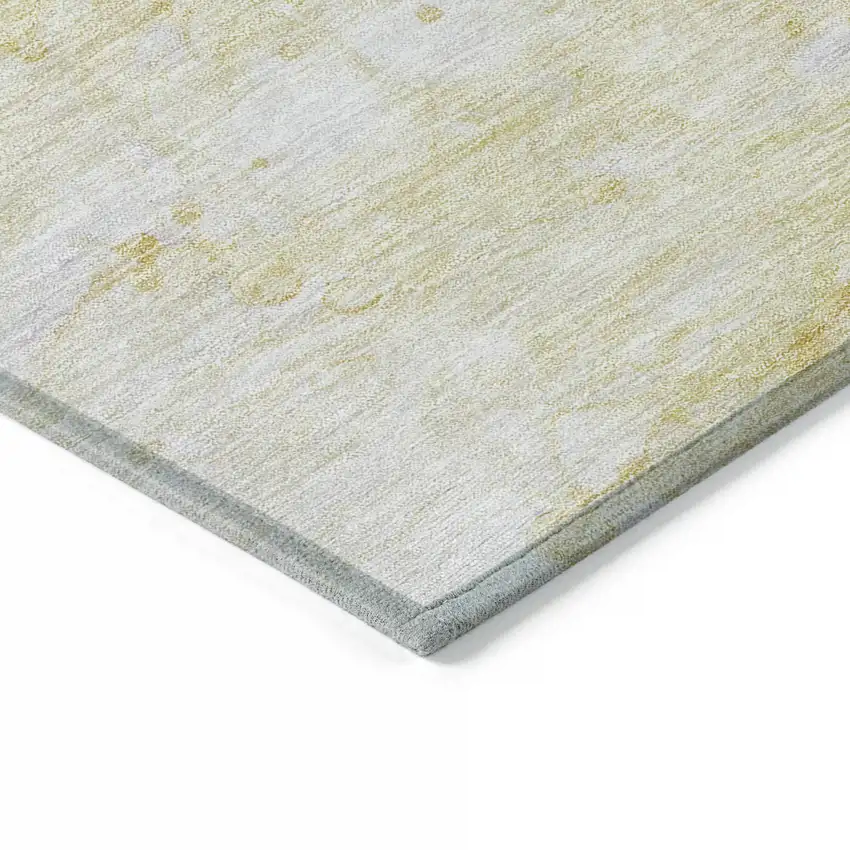Gold Beige And Ivory Abstract Washable Indoor Outdoor Area Rug Photo 3