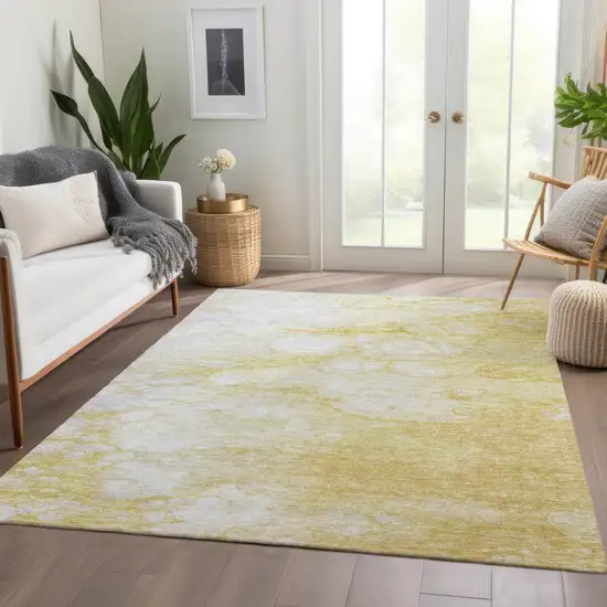 Gold Beige And Ivory Abstract Washable Indoor Outdoor Area Rug Photo 7