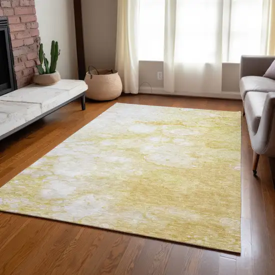 Gold Beige And Ivory Abstract Washable Indoor Outdoor Area Rug Photo 8
