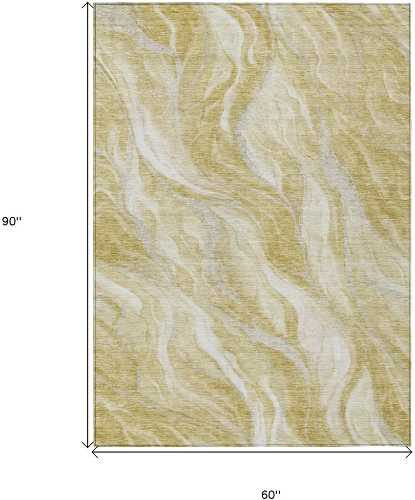 Gold Beige And Ivory Abstract Washable Indoor Outdoor Area Rug Photo 3