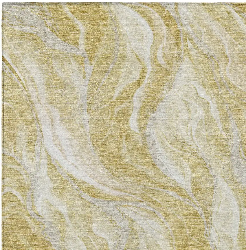 Gold Beige And Ivory Abstract Washable Indoor Outdoor Area Rug Photo 4