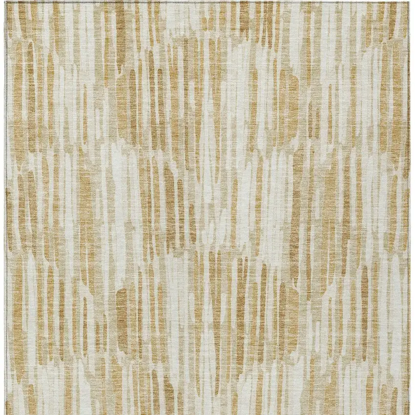 Gold Beige And Ivory Abstract Washable Indoor Outdoor Area Rug Photo 5