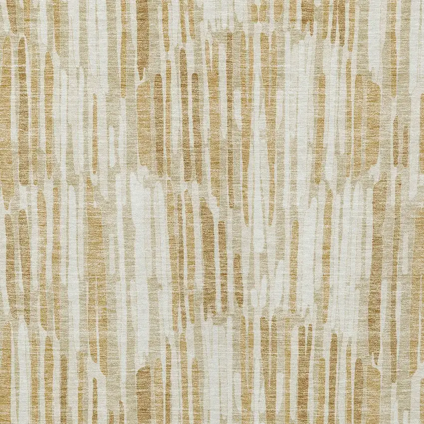 Gold Beige And Ivory Abstract Washable Indoor Outdoor Area Rug Photo 4