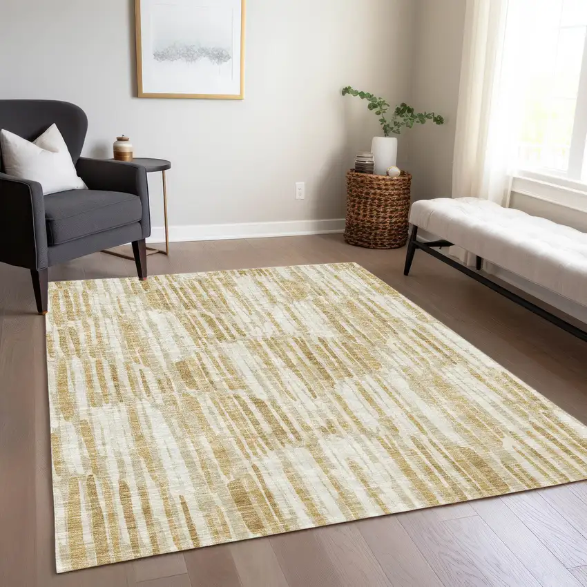 Gold Beige And Ivory Abstract Washable Indoor Outdoor Area Rug Photo 8
