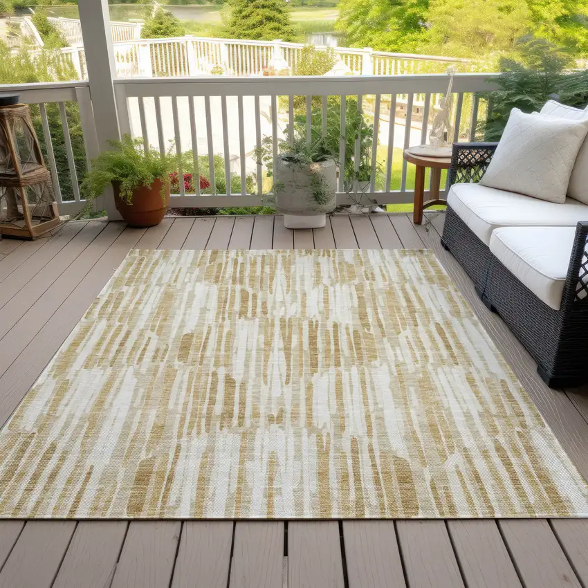 Gold Beige And Ivory Abstract Washable Indoor Outdoor Area Rug Photo 6