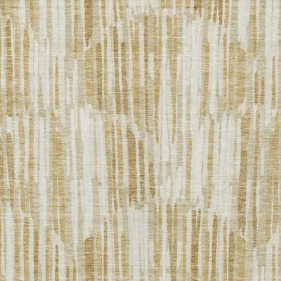 Gold Beige And Ivory Abstract Washable Indoor Outdoor Area Rug Photo 4