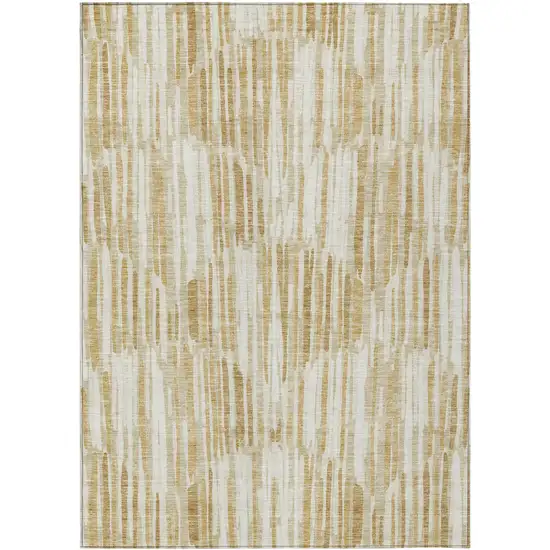 Gold Beige And Ivory Abstract Washable Indoor Outdoor Area Rug Photo 2