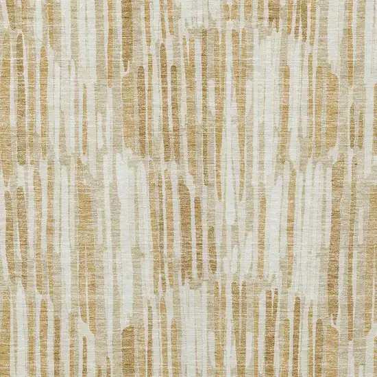 Gold Beige And Ivory Abstract Washable Indoor Outdoor Area Rug Photo 4