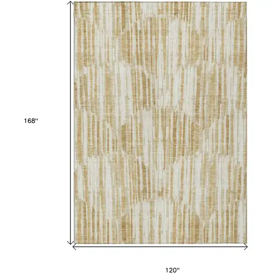 Gold Beige And Ivory Abstract Washable Indoor Outdoor Area Rug Photo 3
