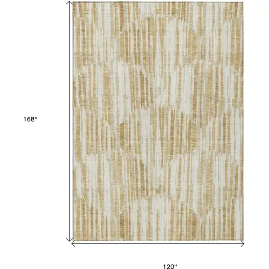 Gold Beige And Ivory Abstract Washable Indoor Outdoor Area Rug Photo 3