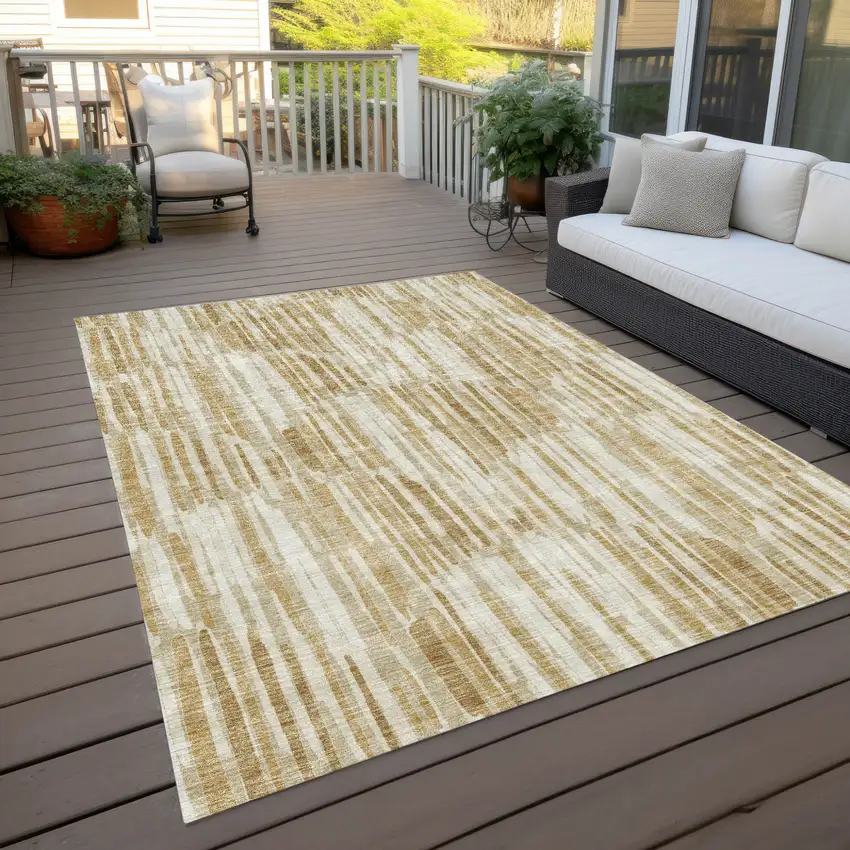 Gold Beige And Ivory Abstract Washable Indoor Outdoor Area Rug Photo 9