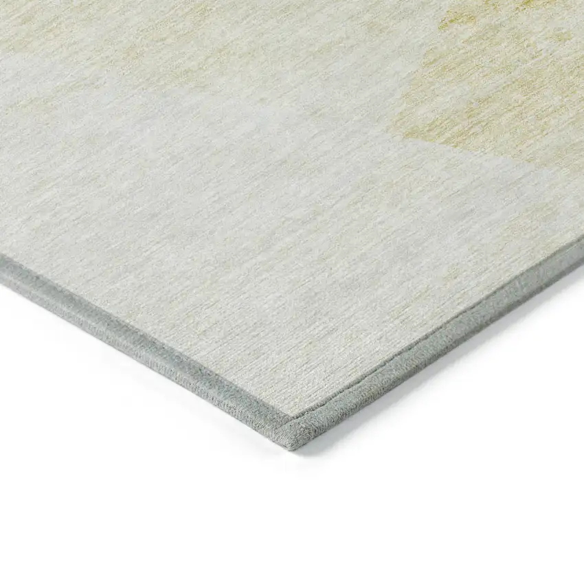 Gold Beige And Ivory Abstract Washable Indoor Outdoor Area Rug Photo 4