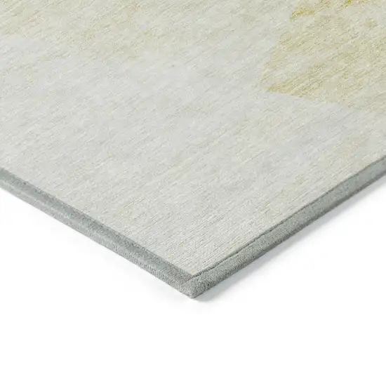 Gold Beige And Ivory Abstract Washable Indoor Outdoor Area Rug Photo 4