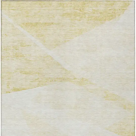 Gold Beige And Ivory Abstract Washable Indoor Outdoor Area Rug Photo 5