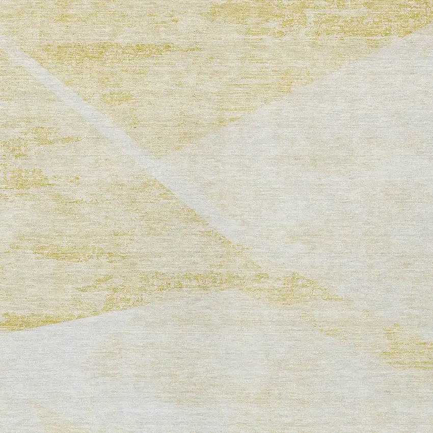 Gold Beige And Ivory Abstract Washable Indoor Outdoor Area Rug Photo 4