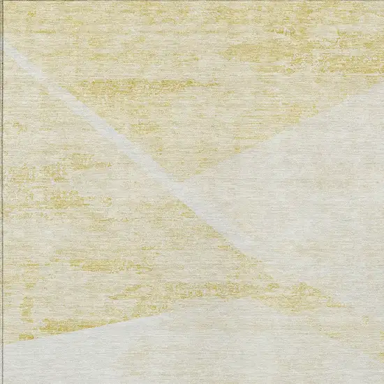 Gold Beige And Ivory Abstract Washable Indoor Outdoor Area Rug Photo 4