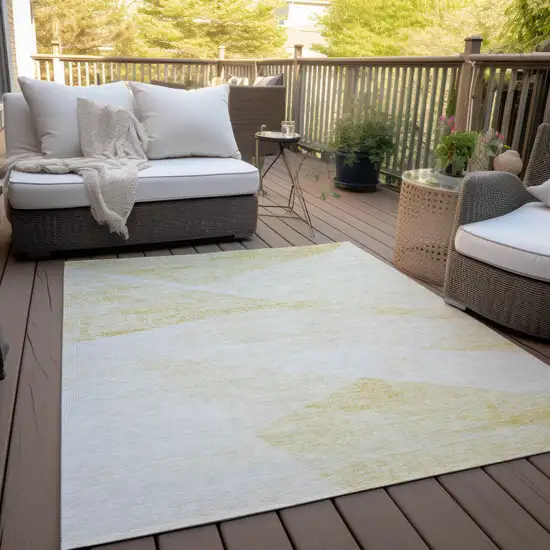 Gold Beige And Ivory Abstract Washable Indoor Outdoor Area Rug Photo 6