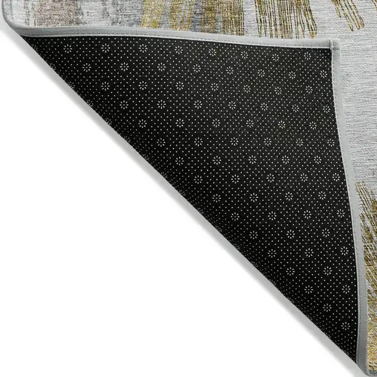 Gold Beige And Ivory Abstract Washable Indoor Outdoor Area Rug Photo 3