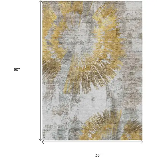 Gold Beige And Ivory Abstract Washable Indoor Outdoor Area Rug Photo 8