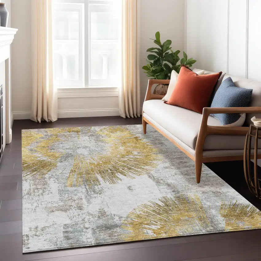 Gold Beige And Ivory Abstract Washable Indoor Outdoor Area Rug Photo 9