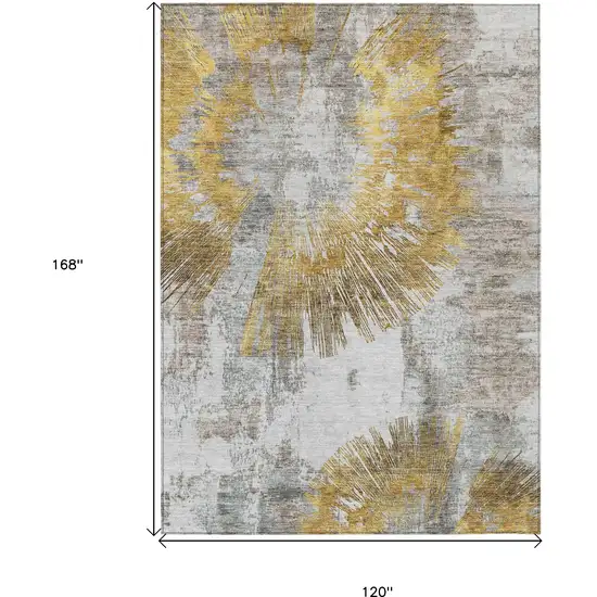 Gold Beige And Ivory Abstract Washable Indoor Outdoor Area Rug Photo 3