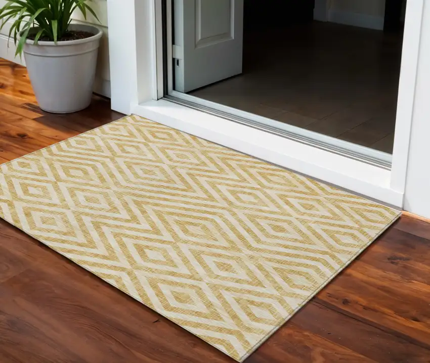 Gold Beige And Ivory Geometric Washable Indoor Outdoor Area Rug Photo 1
