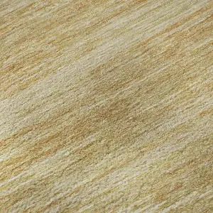Photo of Gold Beige And Ivory Striped Washable Area Rug With UV Protection