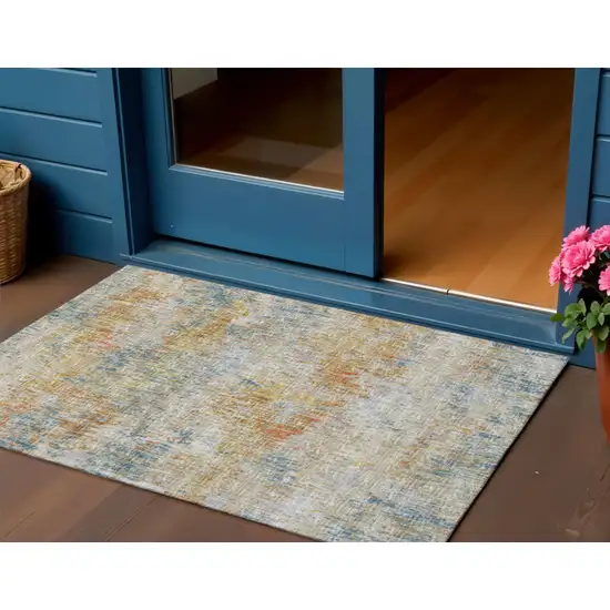 Gold Beige And Orange Abstract Washable Indoor Outdoor Area Rug Photo 1